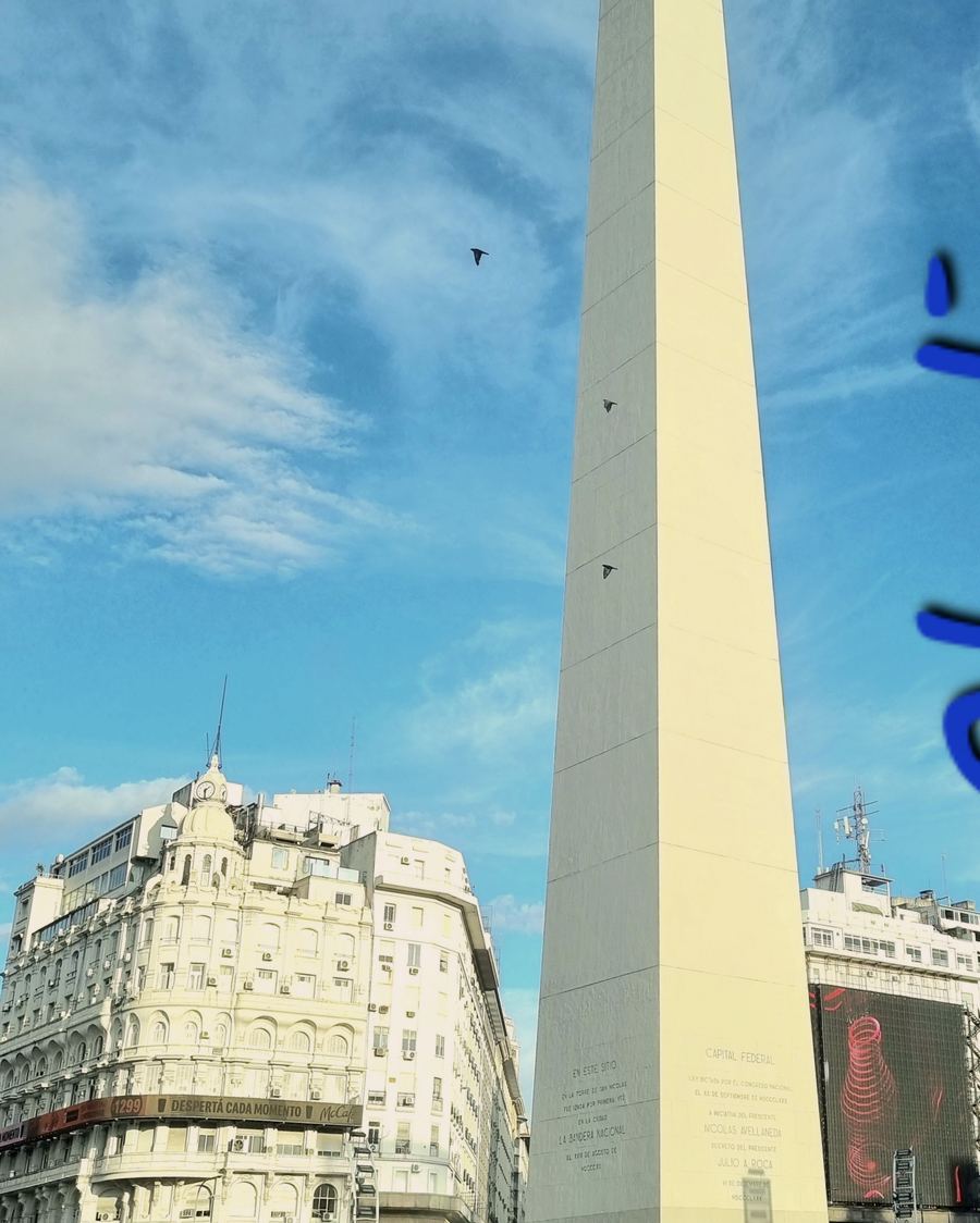 The Obelisk of Buenos Aires against a blue sky