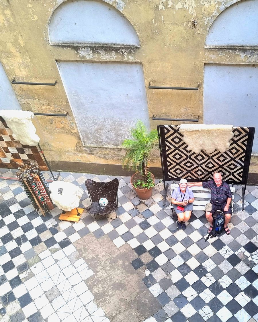 Antique furniture and rugs displayed in a San Telmo courtyard, Buenos Aires